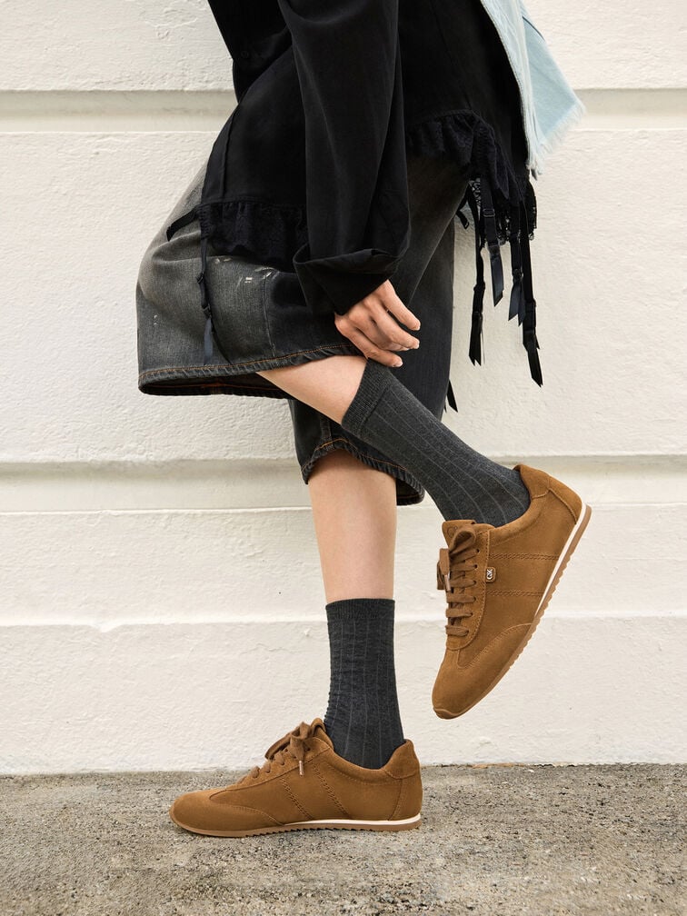 Laced sneakers made with real, delicate suede require special care.