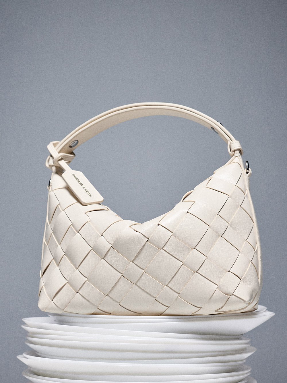 Ivette Woven Shoulder Bag in cream - CHARLES & KEITH