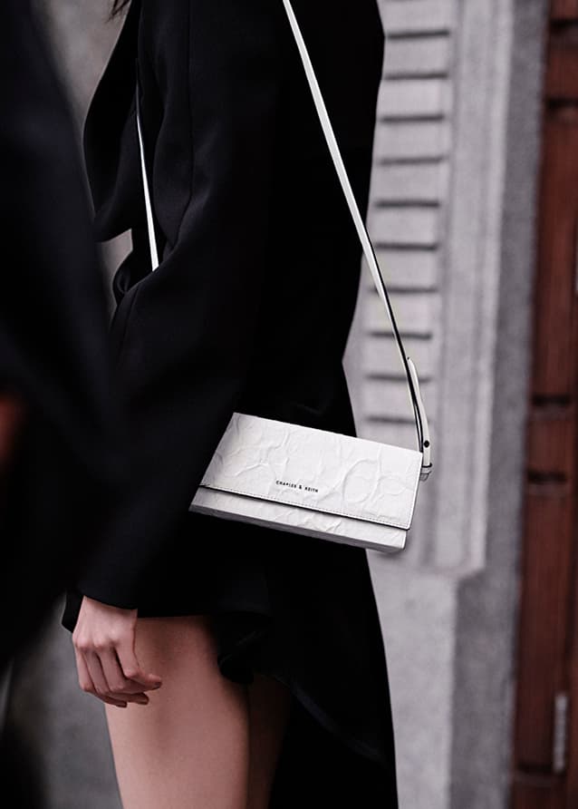 Women’s long boxy crossbody bag in white – CHARLES & KEITH