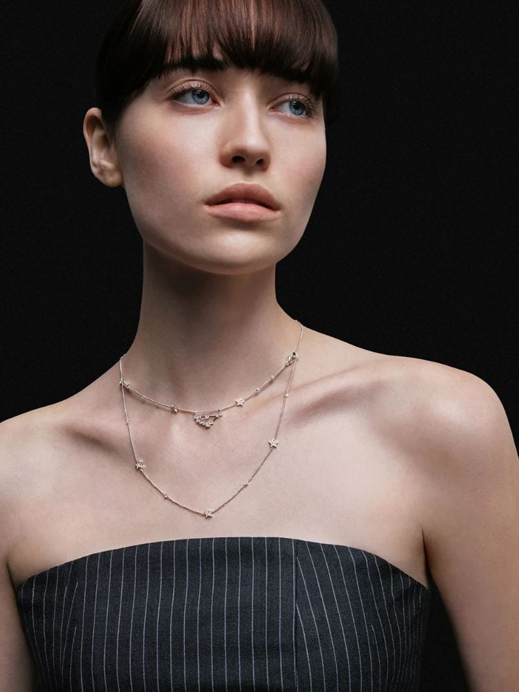 A strapless top will be completely concealed under your graduation gown.  