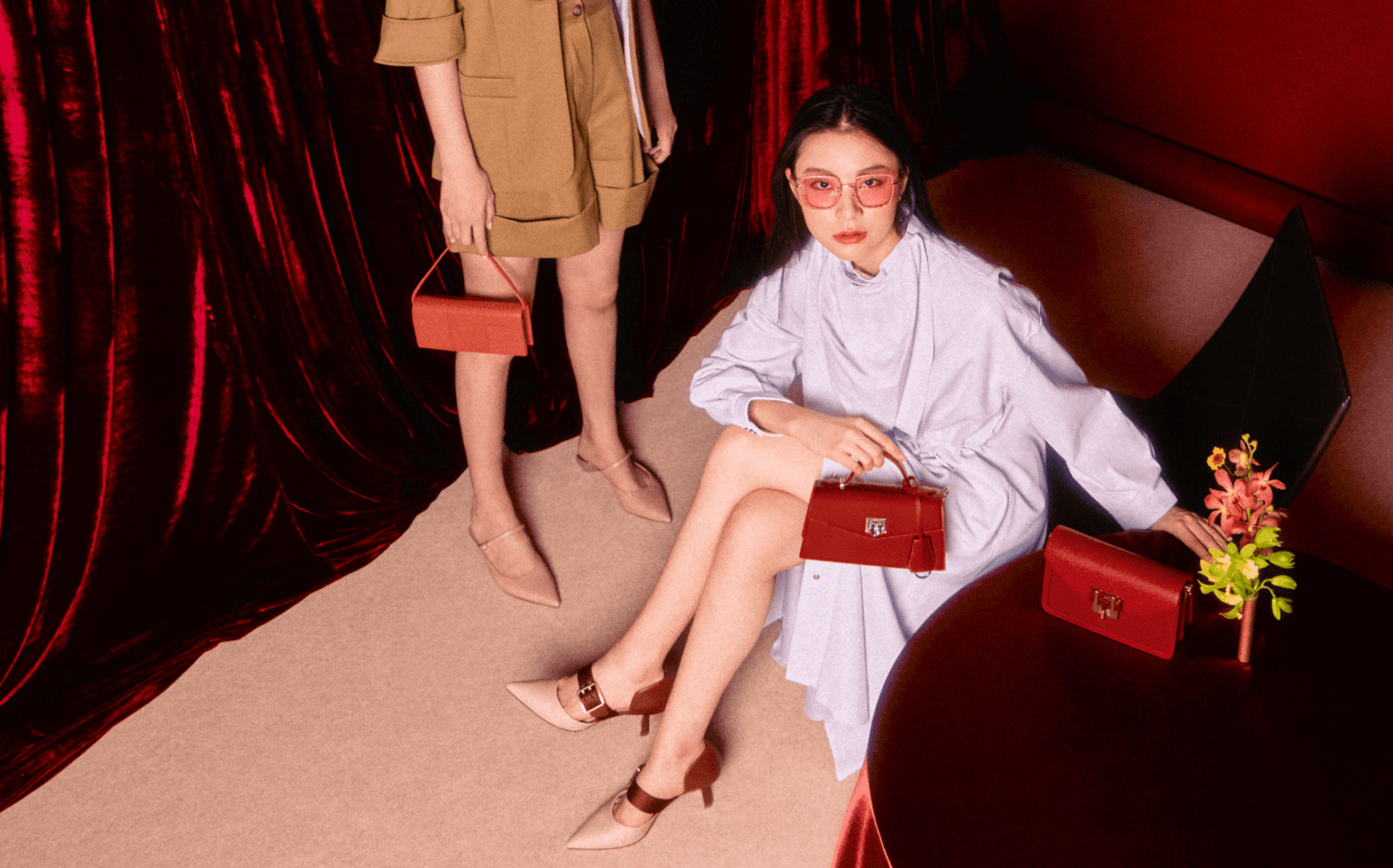 Women’s oversized buckle pointed toe pumps, sculptural heel pointed toe mules, trapeze top handle bag, panelled long wallet and stone-embellished envelope bag – CHARLES & KEITH