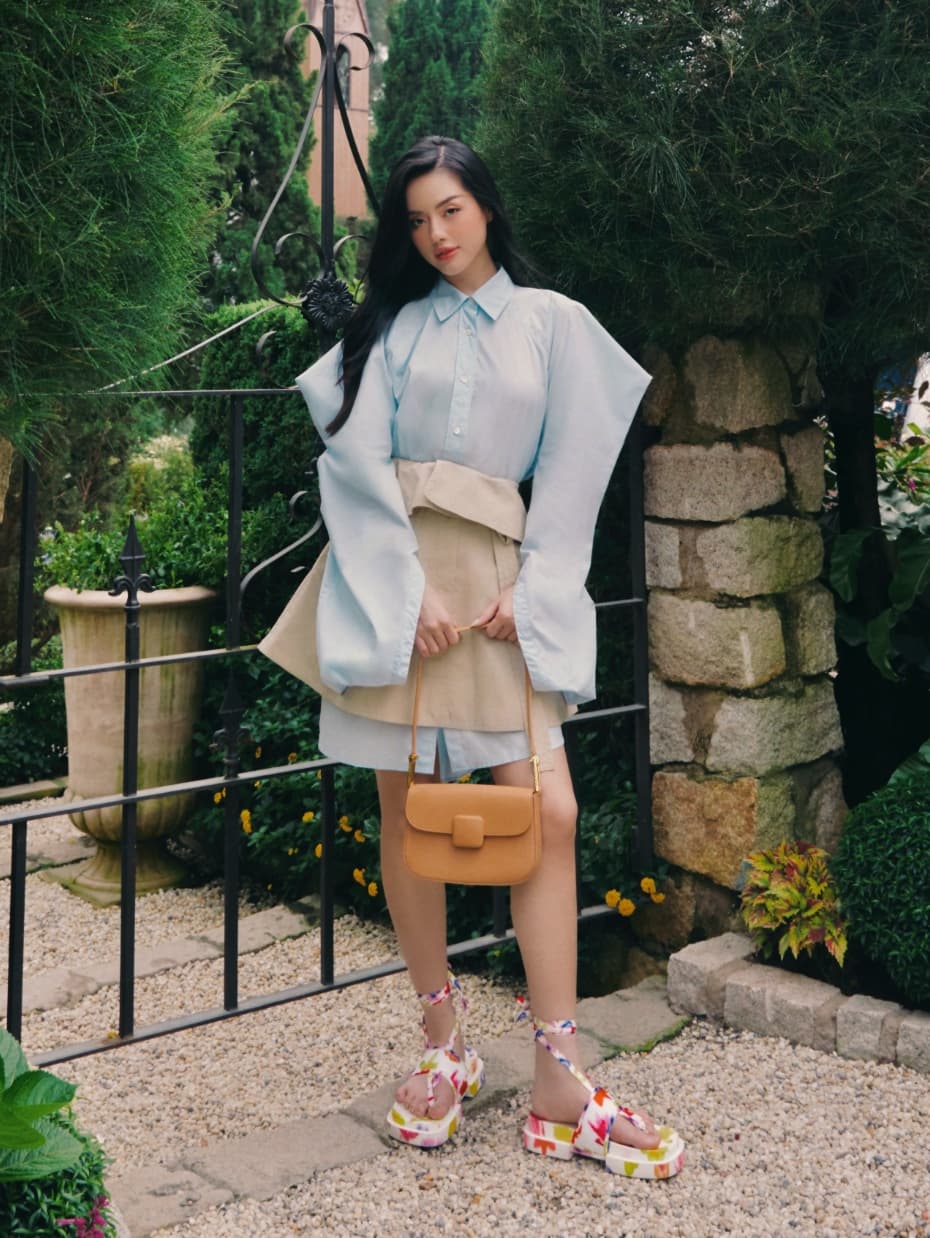 Women’s Koa square push-lock shoulder bag and Alex recycled polyester tie-around thong sandals, as seen on Khanh Linh - CHARLES & KEITH
