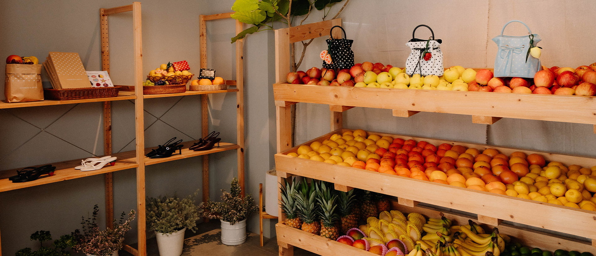 An aesthetic shot of CHARLES & KEITH Kraft paper bags and stickers