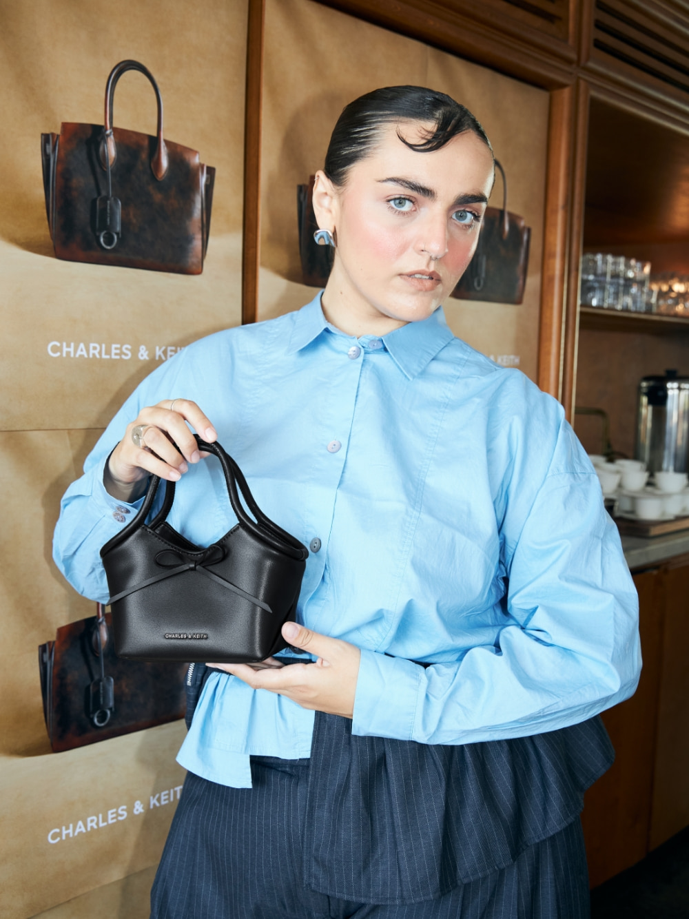Hazel Bow Tubular Top Handle Bag in black - CHARLES & KEITH