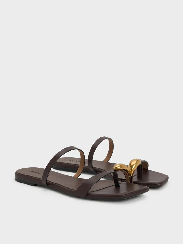 Maroon toe-ring sandals in rich jewel tone, ideal for cold-weather festive dressing.
