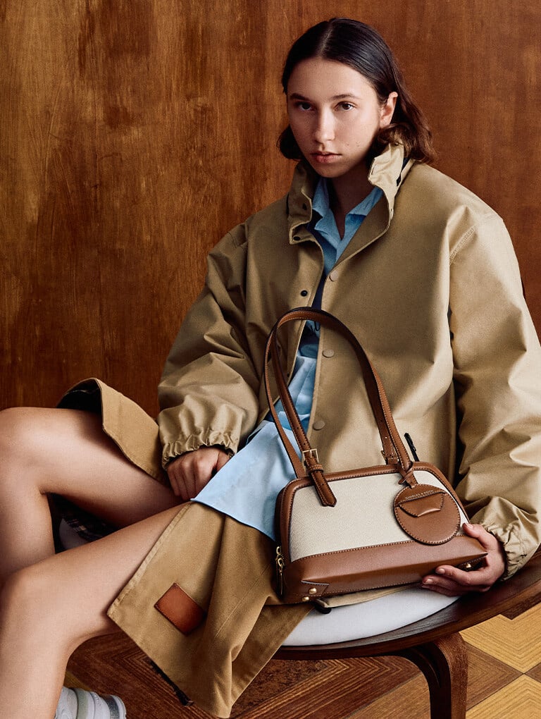 Women’s Enola canvas two-tone bowling bag in chocolate - CHARLES & KEITH