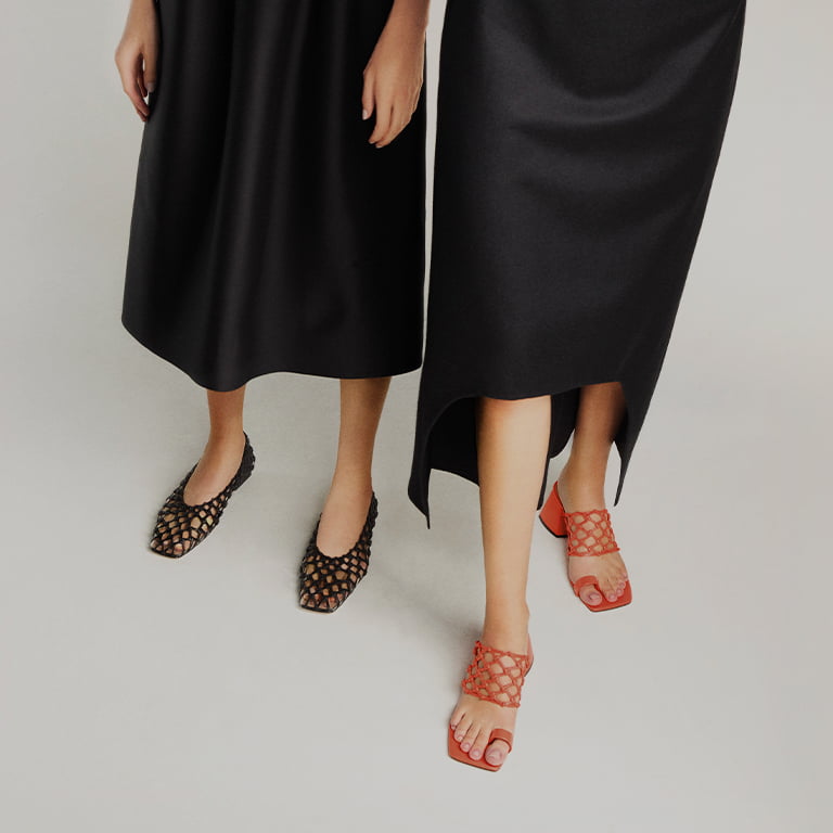 Women’s woven caged ballerina flats in black and woven toe ring sandals in orange – CHARLES & KEITH