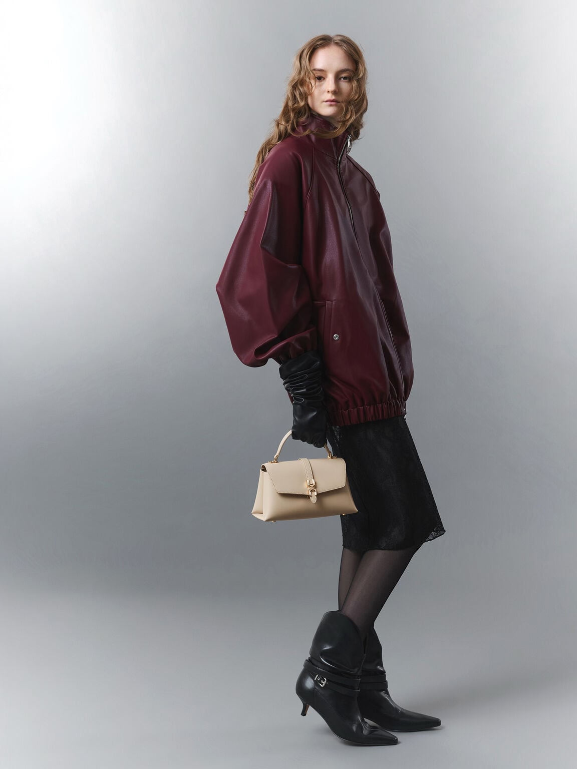 A loose jacket pairs well with a midi dress. 