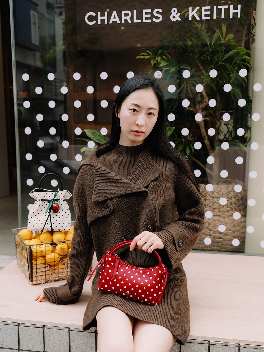 Hazel Bow Polka-Dot Top Handle Bag in equestrian red - CHARLES & KEITH