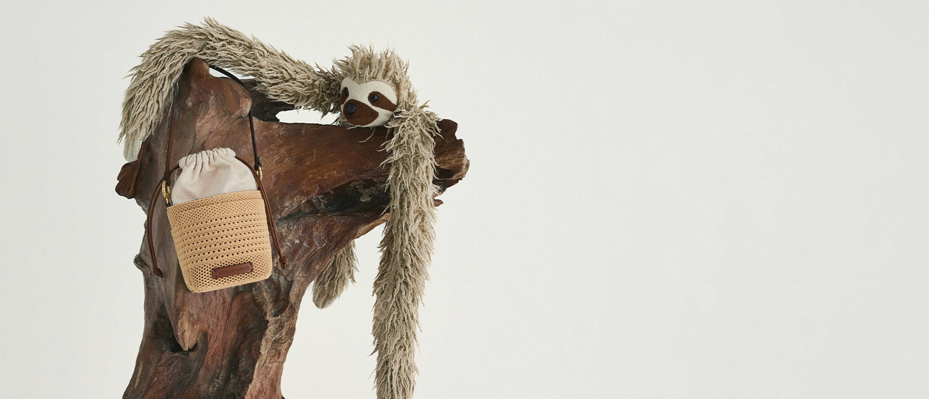 Girls’ Ida knitted bucket bag in beige - CHARLES & KEITH