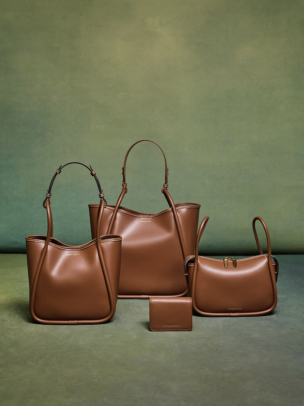 Women’s Lyla shoulder bag, mini Lyla tubular tote bag, Lyla knotted-strap wallet and Lyla tubular slouchy tote bag - CHARLES & KEITH