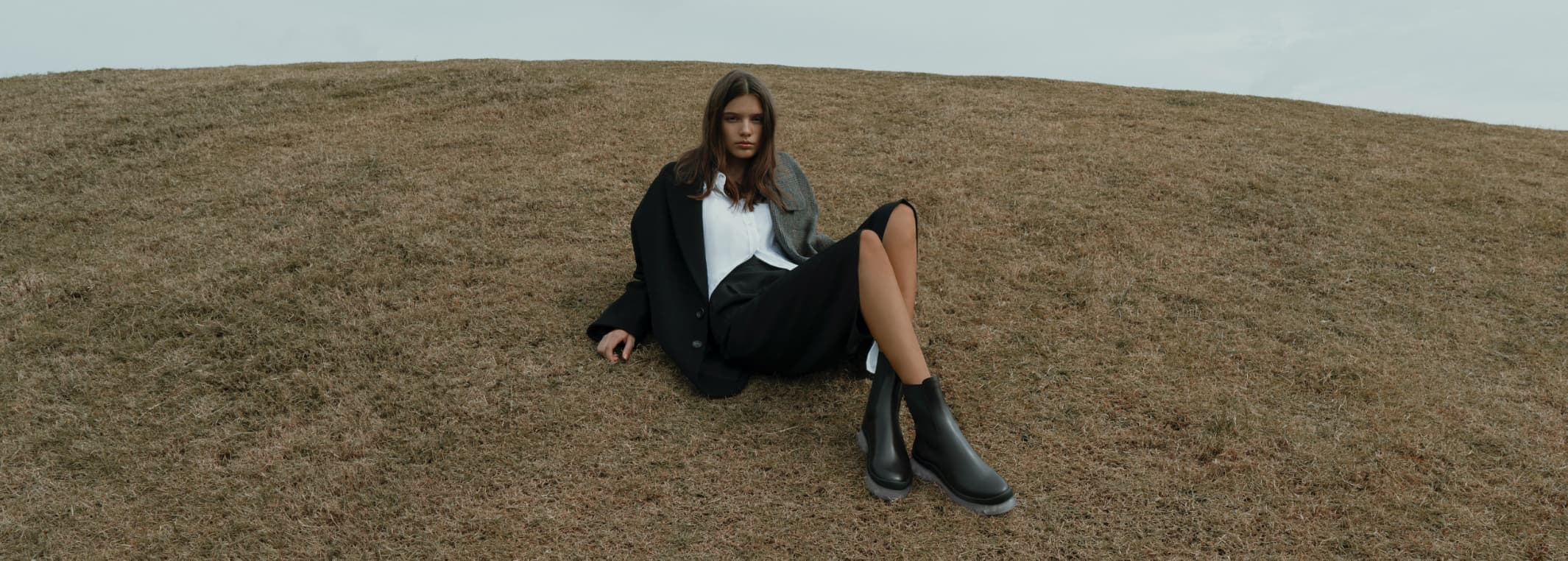 Women’s clear sole Chelsea boots in black (front view) - CHARLES & KEITH