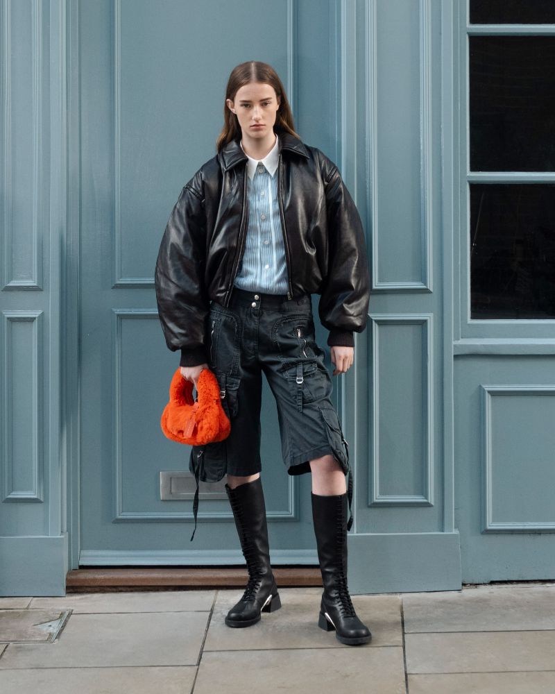 Women’s orange mini Yama furry top handle bag and black Devon metallic-accent lace-up knee-high boots - CHARLES & KEITH