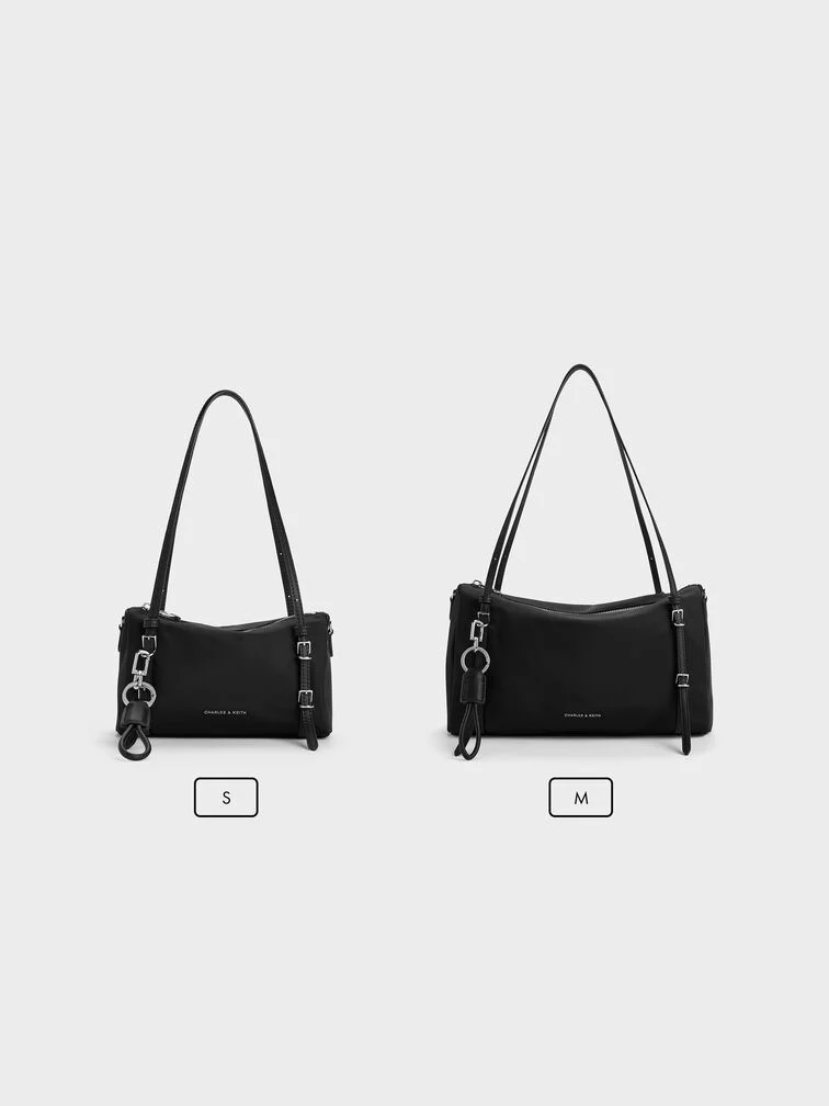  A visual comparison of the small and medium Levy shoulder bag.