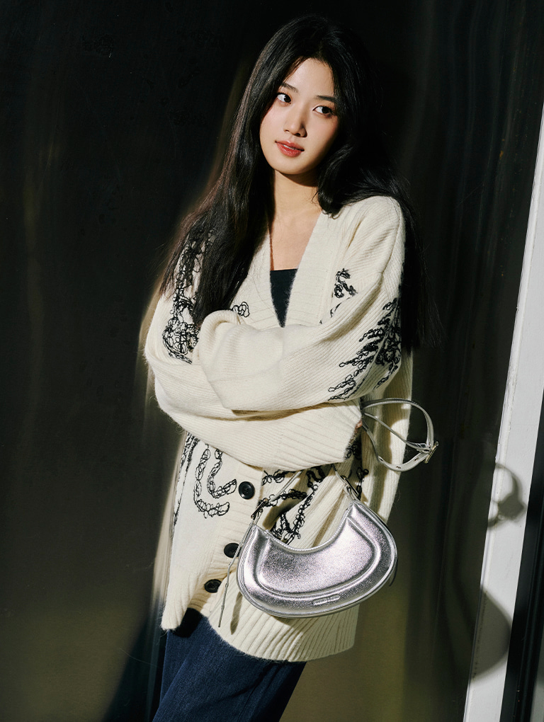 Women’s Petra curved shoulder bag in silver, as seen on Irene Lu Yu Xiao – CHARLES & KEITH