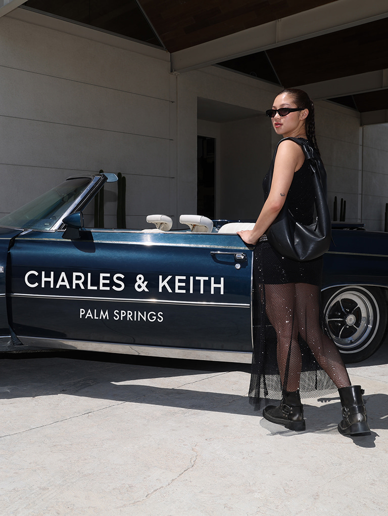 Women’s Toni knotted curved hobo bag and metallic buckled ankle boots, as seen on Isabelle Sung - CHARLES & KEITH