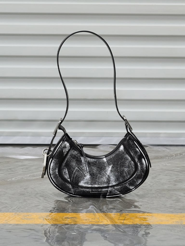 Women’s Petra foil-print curved shoulder bag in noir & Robbie platform knee-high boots in black - CHARLES & KEITH