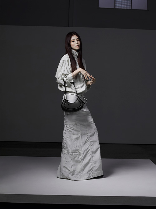 Black Petra curved shoulder bag