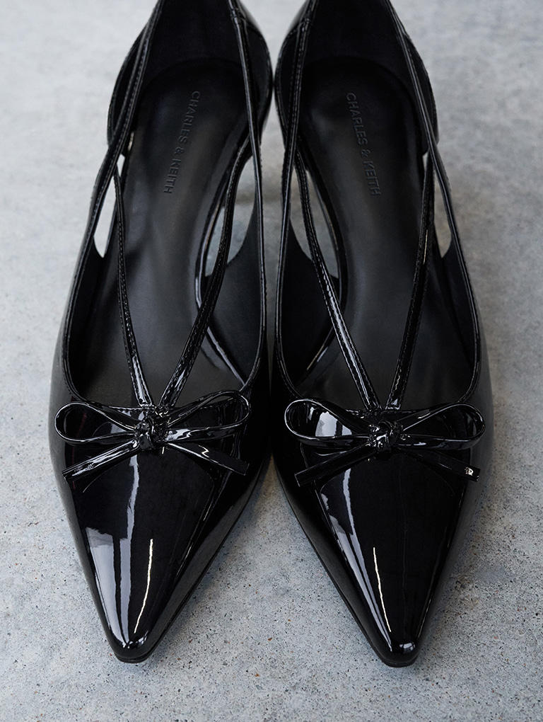 Women’s patent cut-out bow kitten-heel pumps in black (close up) – CHARLES & KEITH