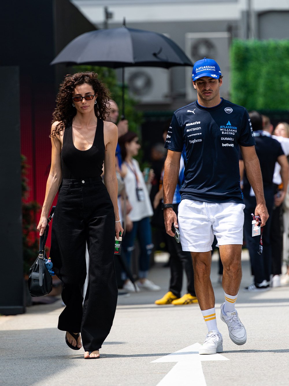 Women’s Khai side-pocket shoulder bag & Wynn sculptural-heel thong sandals, as seen on Rebecca Donaldson - CHARLES & KEITH