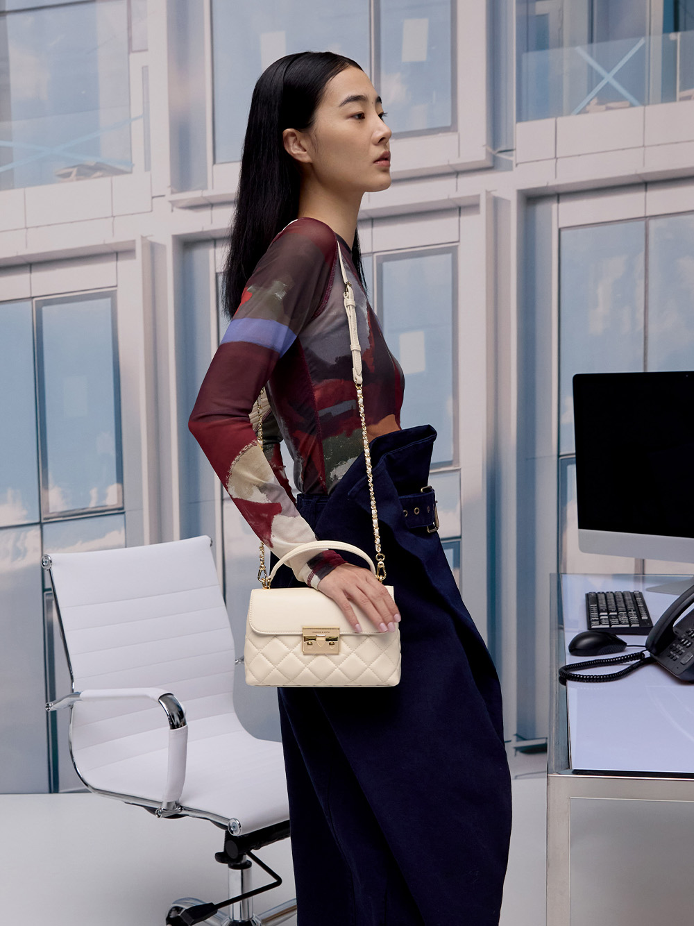 Women’s Alva quilted top handle bag in cream - CHARLES & KEITH