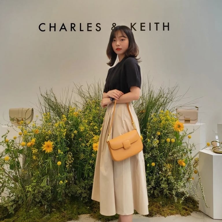Women’s Koa square push-lock shoulder bag in orange, as seen on Yoon Da Gyeong - CHARLES & KEITH