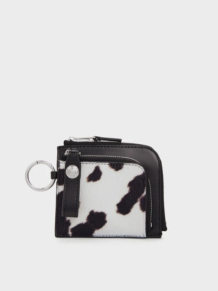 An animal-print card holder would add a small statement-making element to your daily routine.