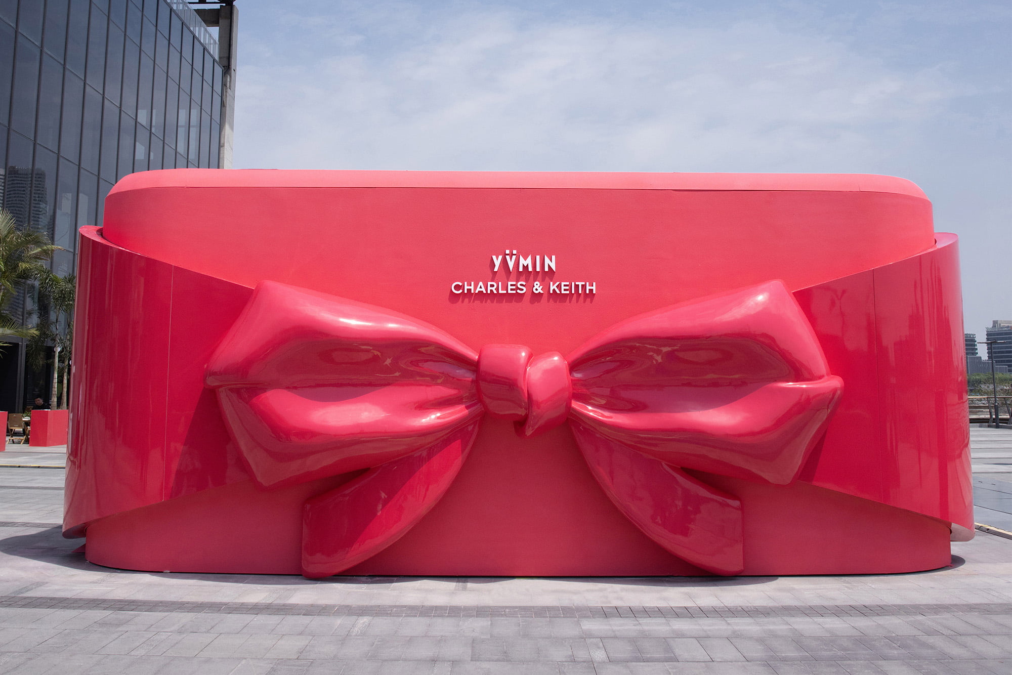 Giant bow on the front of the Shanghai pop-up — CHARLES & KEITH