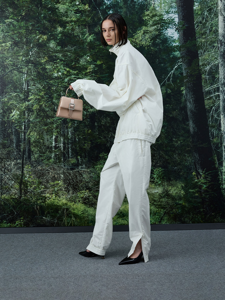 Sammie Satin Crystal-Buckle Belted Top Handle Bag in nude and Patent Pointed-Toe Sculptural-Heel Slingback Pumps in black — CHARLES & KEITH