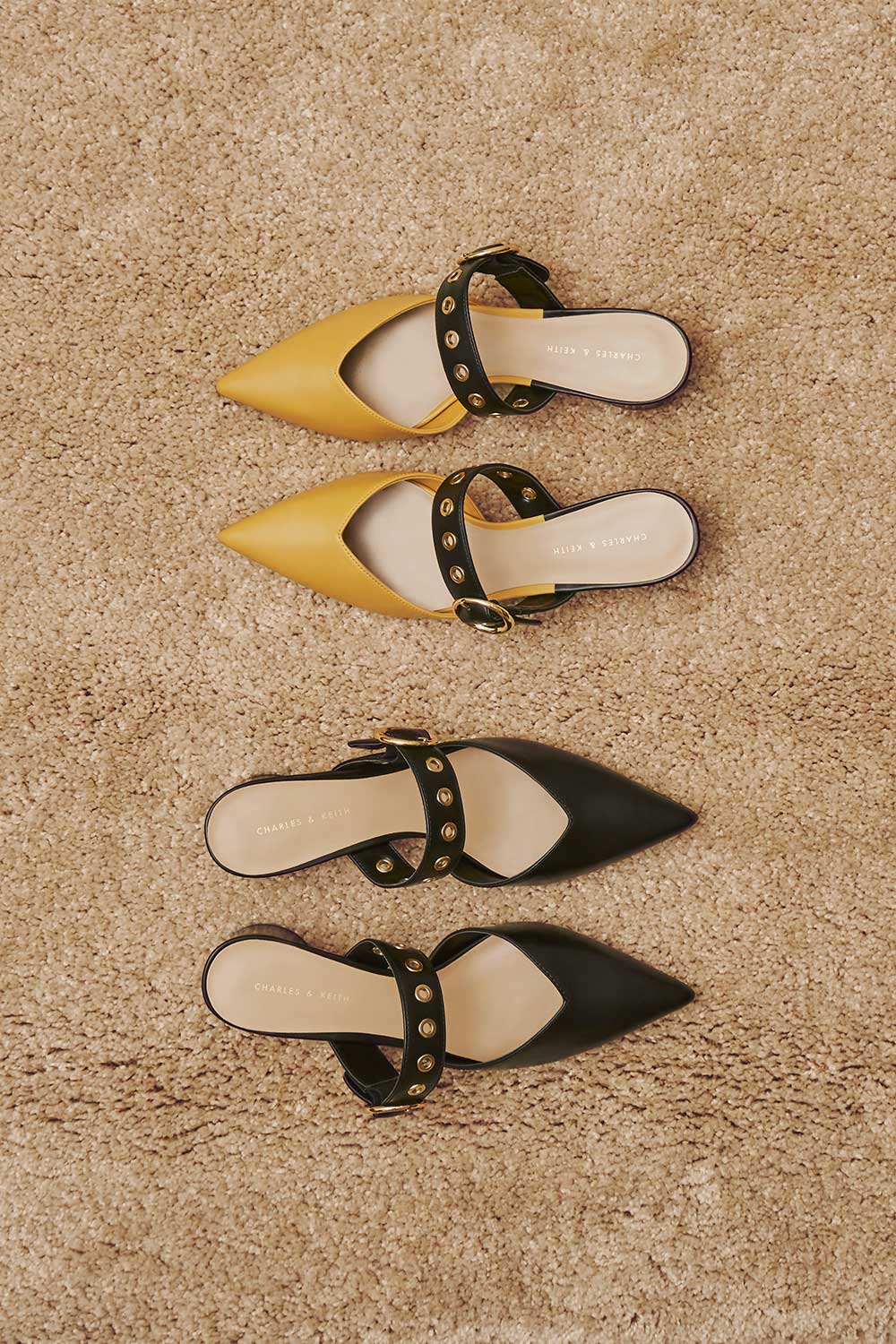 Women's eyelet embellished mules in white and yellow - CHARLES & KEITH 