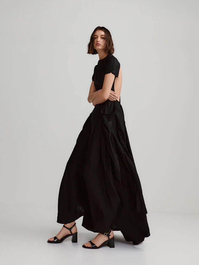 Black patent block-heel sandals, appropriate for black-tie events in warmer climes.