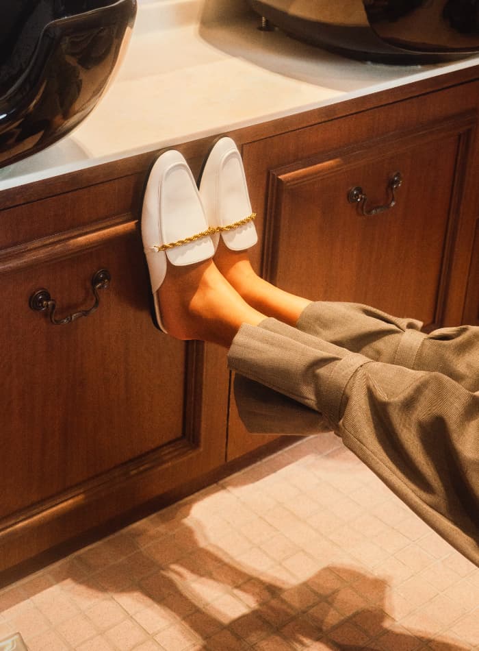 Women’s metallic accent mule flats in white (close up) – CHARLES & KEITH