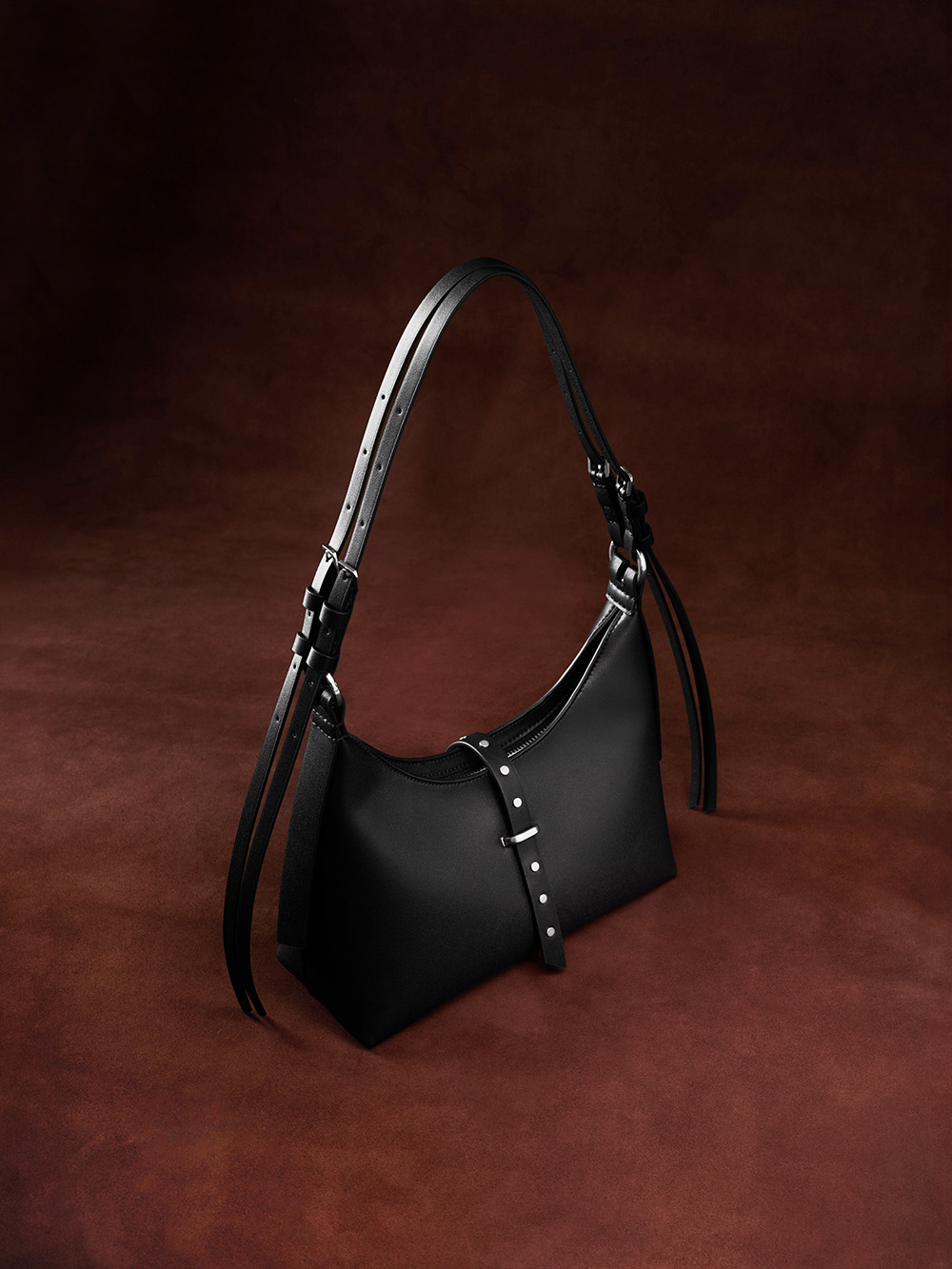 Women’s Lark studded belted shoulder bag in noir - CHARLES & KEITH