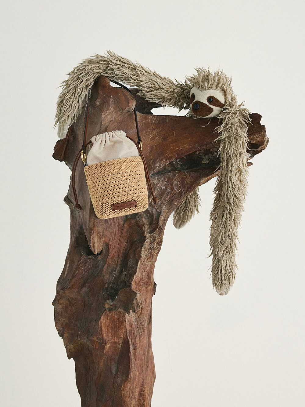 Girls’ Ida knitted bucket bag in beige - CHARLES & KEITH