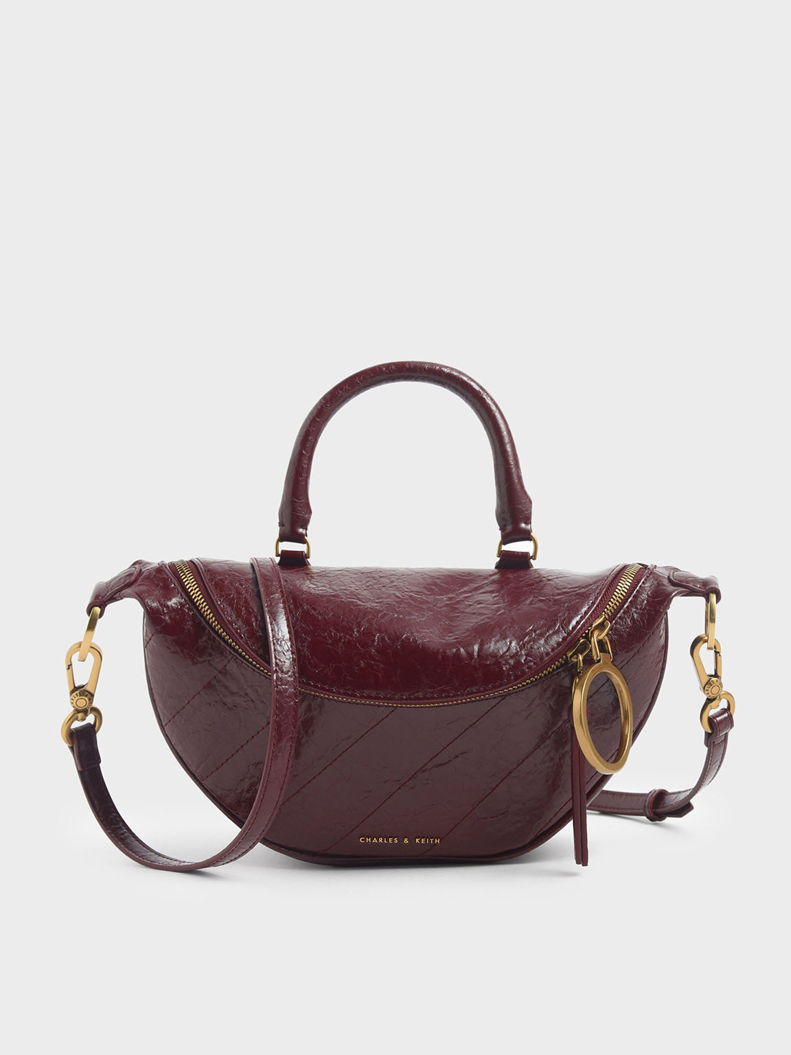 Burgundy Philomena Wrinkled Effect Semi Circle Crossbody Bag CHARLES KEITH UK