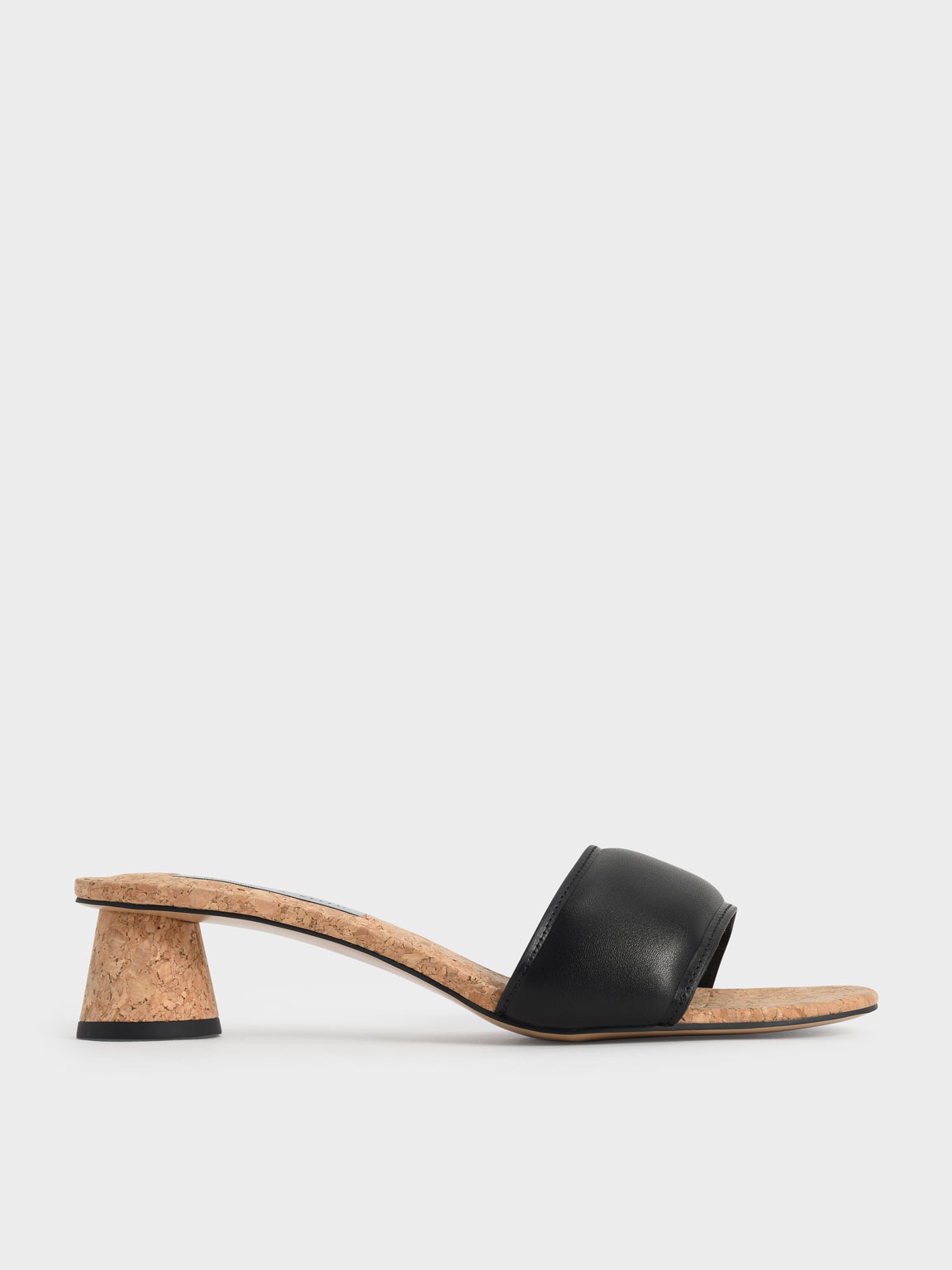 

Puffy Cylindrical Heel Mules