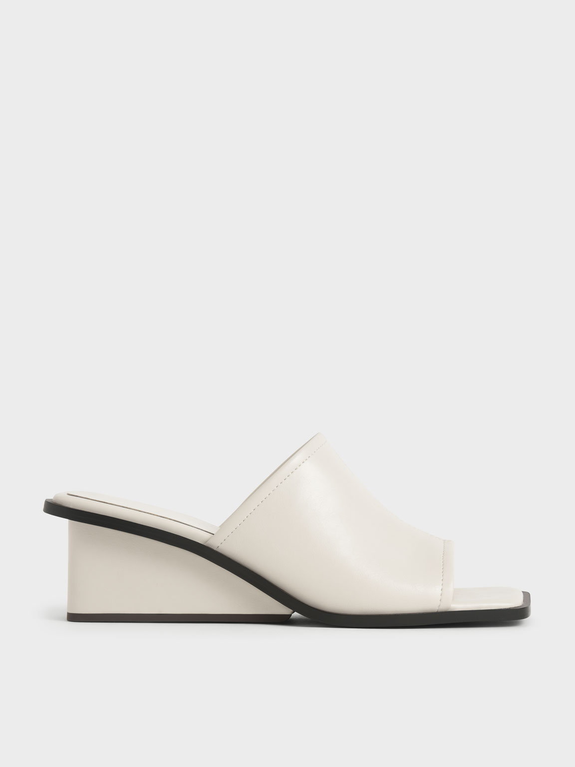 

Square Toe Wedge Mules