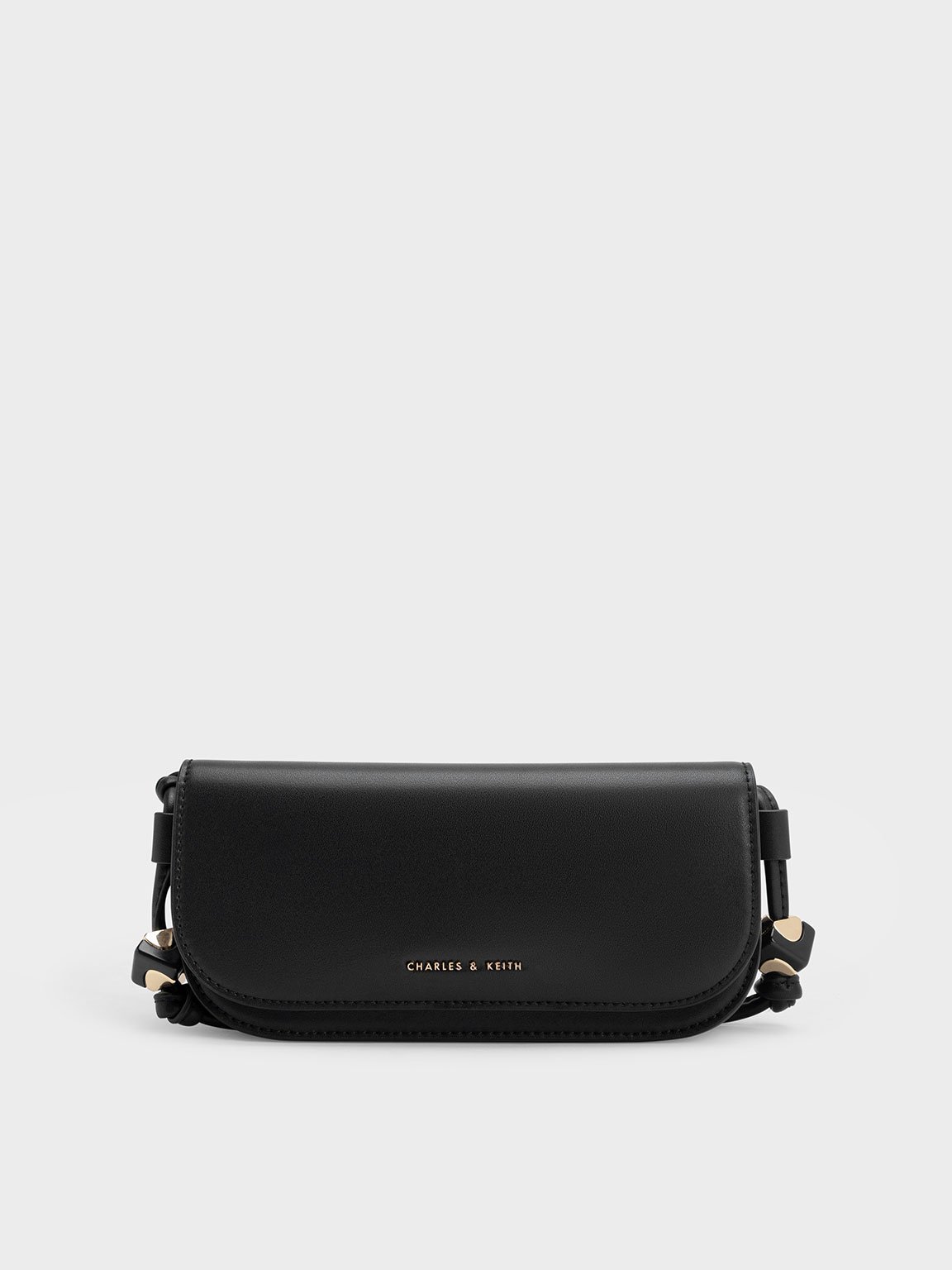 Charles & Keith Cube Knotted Elongated Crossbody Bag In Black