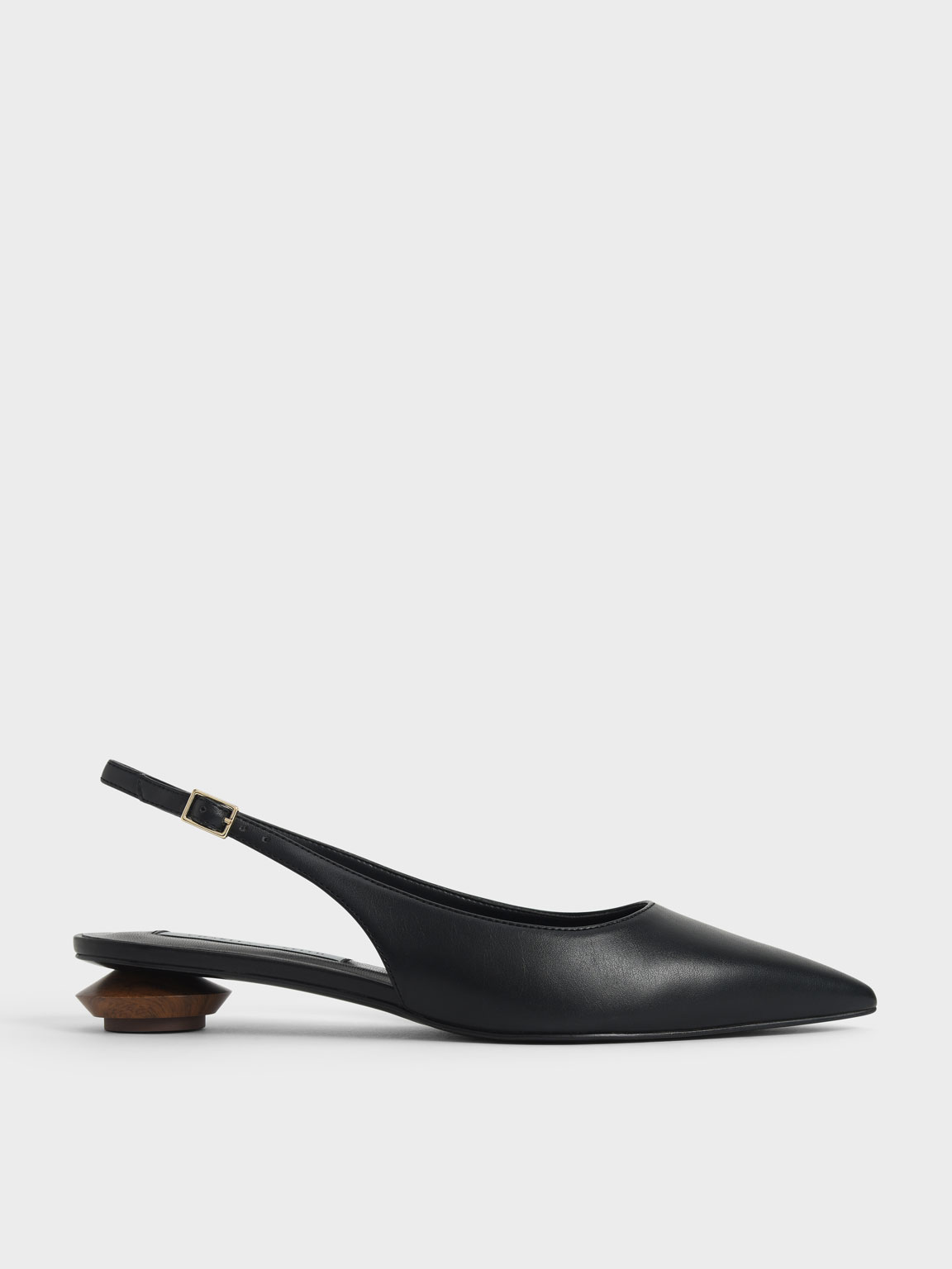 

Sculptural Heel Slingback Pumps