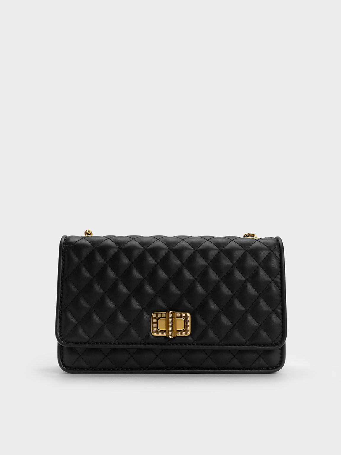 Quilted clutch charles top and keith