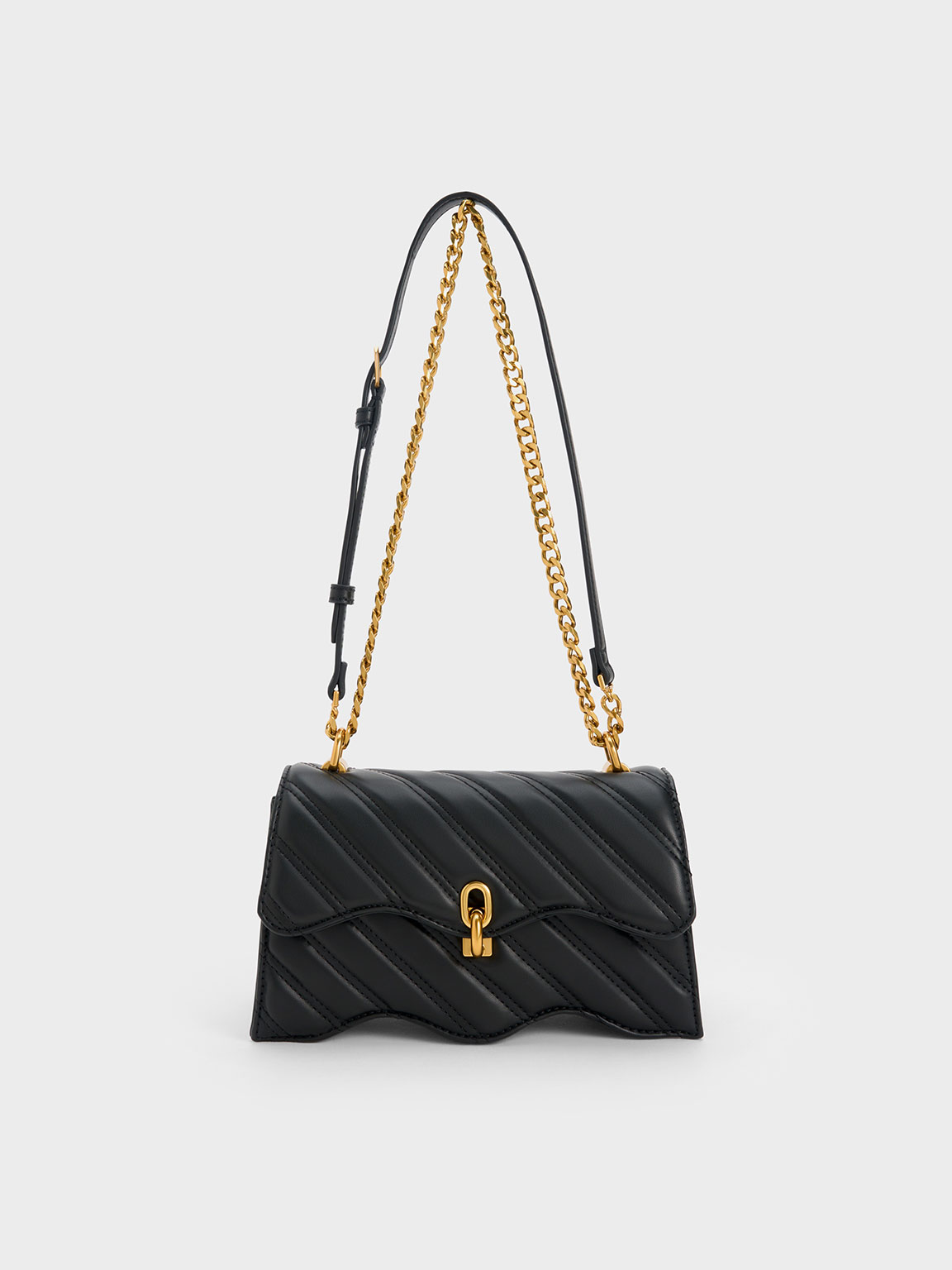 CHARLES & KEITH FREJA WAVY TRAPEZE CROSSBODY BAG