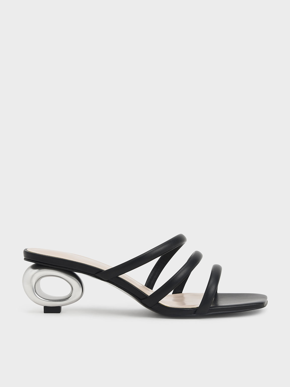 

Sculptural Heel Tubular Mules