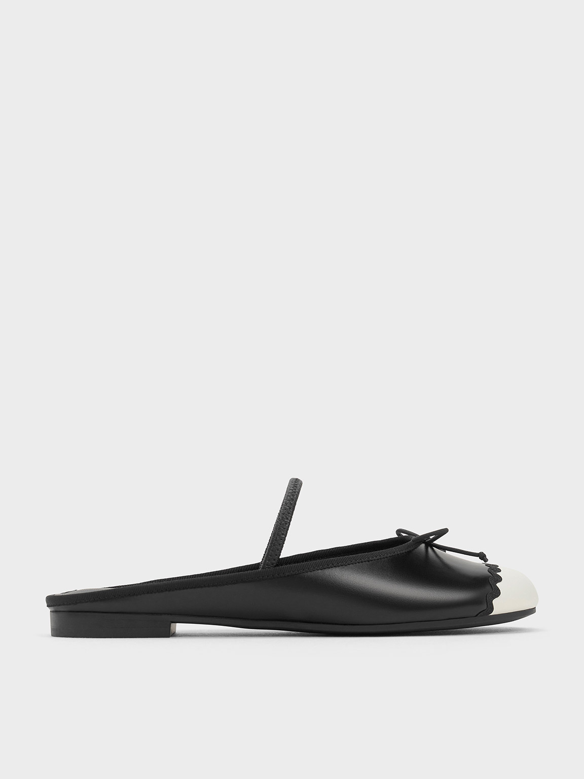 Shop Charles & Keith - Two-tone Bow Slip-on Flats In Black