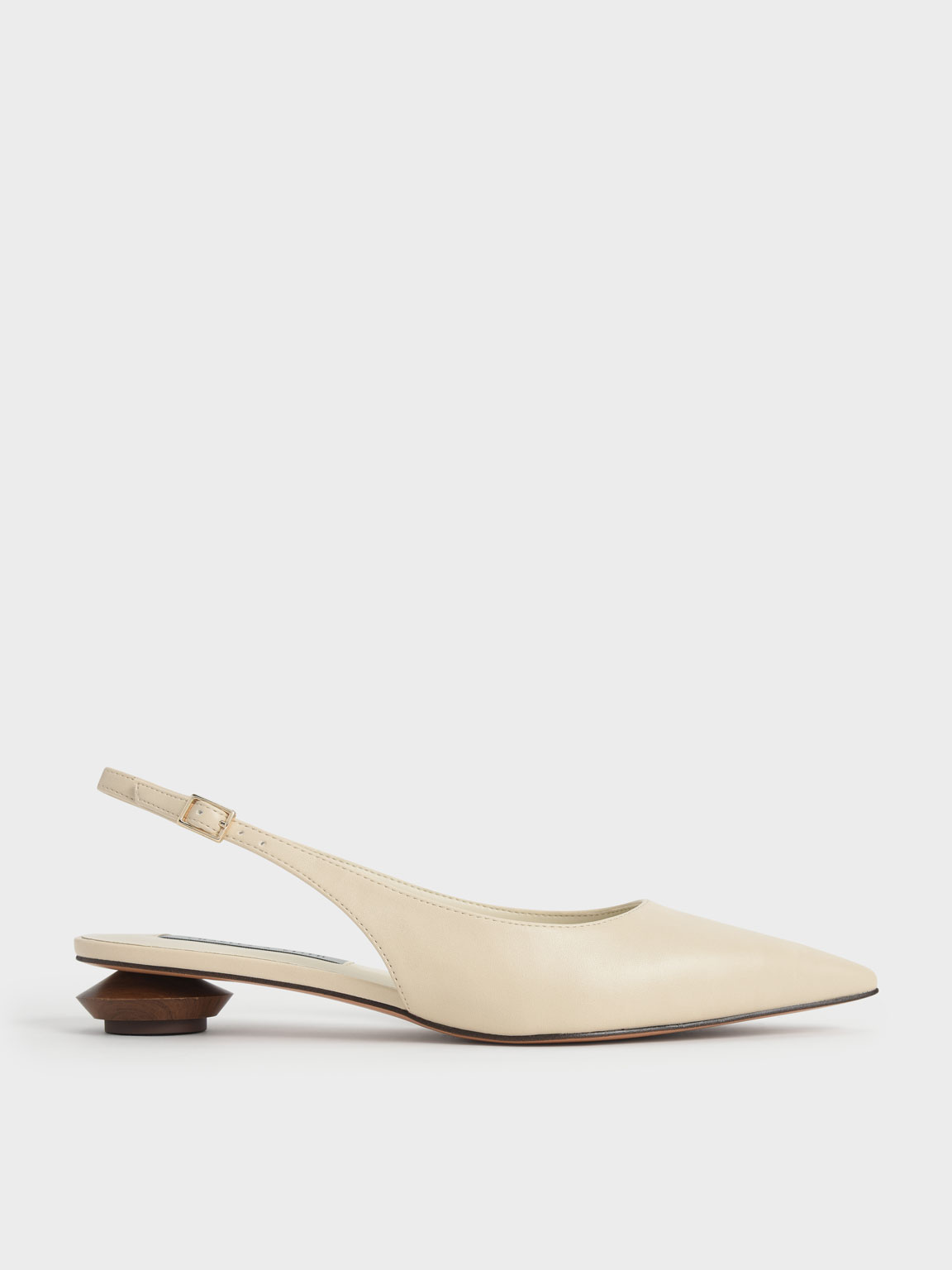 

Sculptural Heel Slingback Pumps