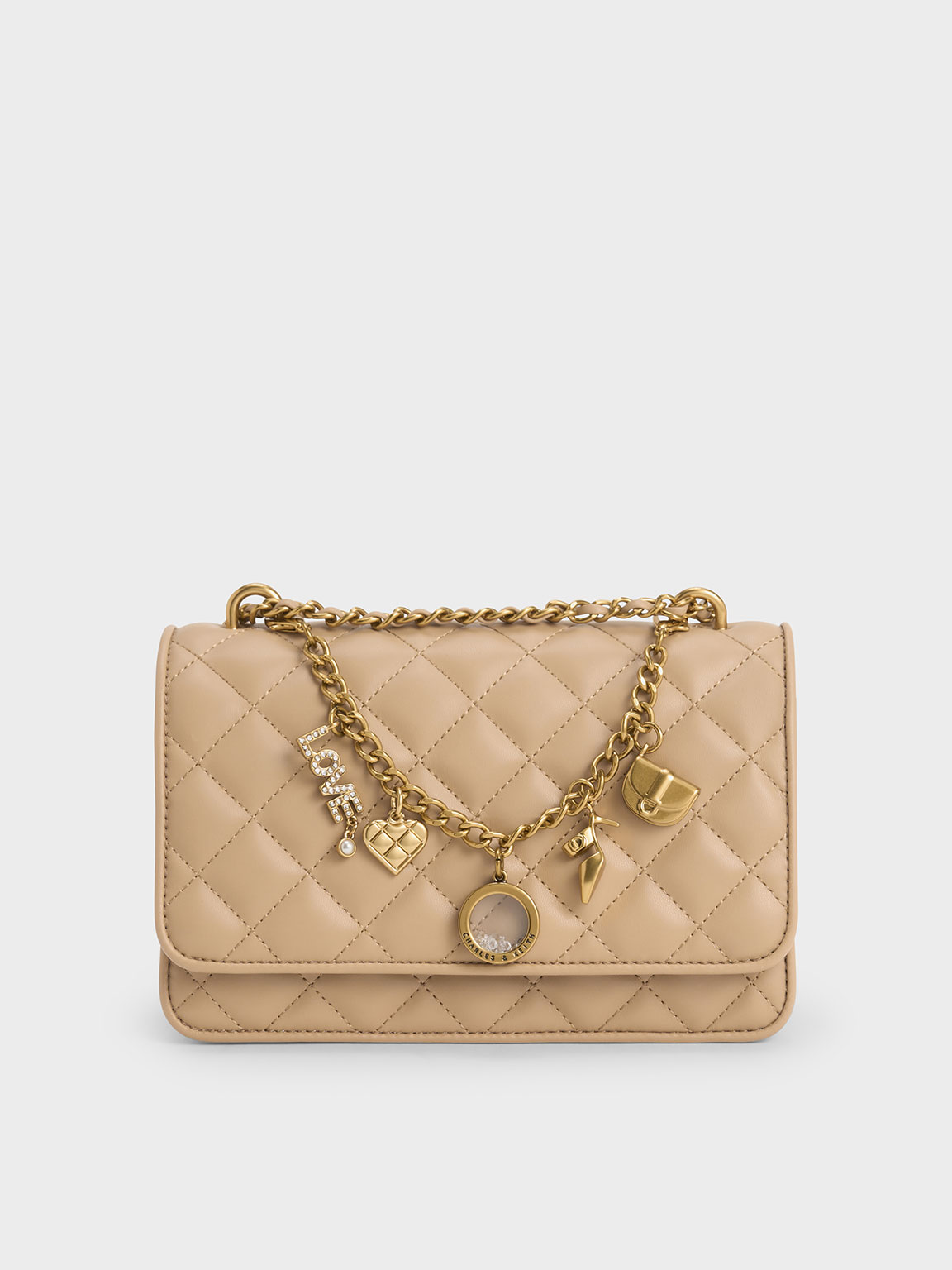 Charles & Keith Charm-embellished Quilted Clutch In Nude