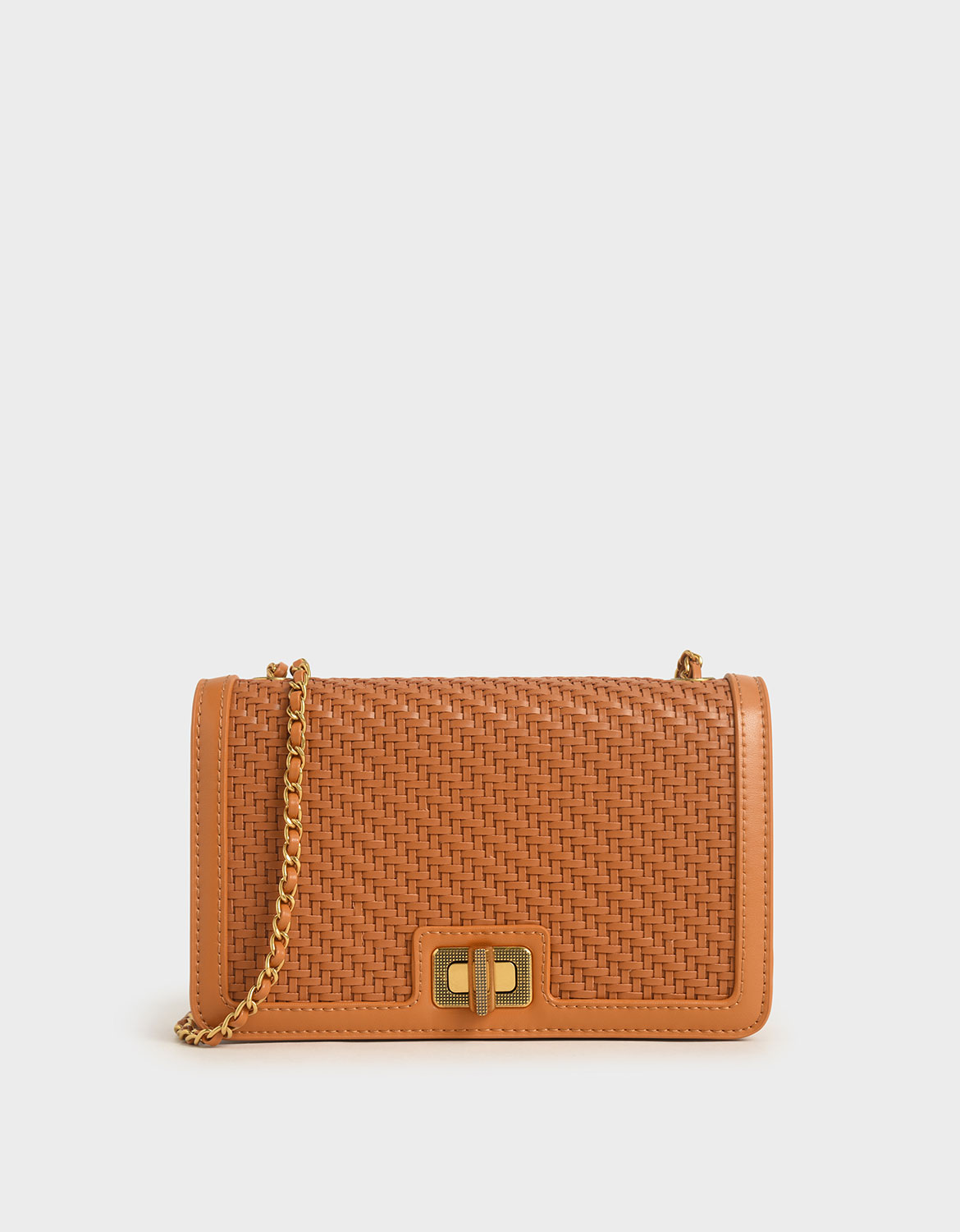 

Woven Turn-Lock Clutch, Cognac