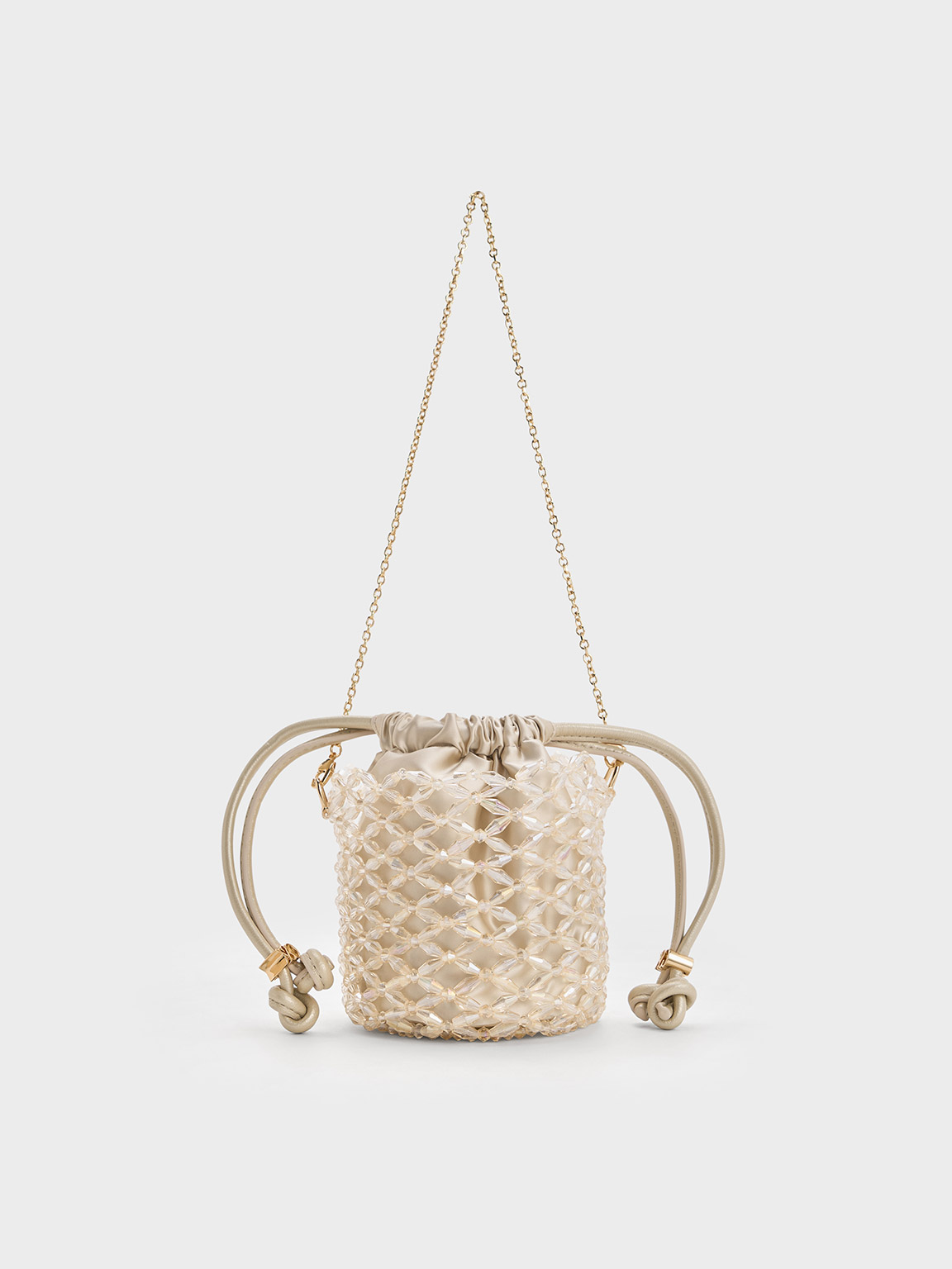 Shop Charles & Keith Beaded Chain-handle Bucket Bag In Champagne