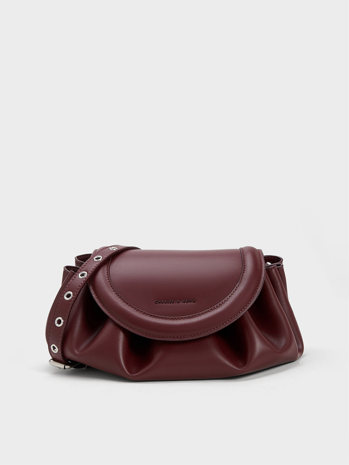 Dark Chocolate Blossom Curved Flap Crossbody Bag | CHARLES & KEITH UK