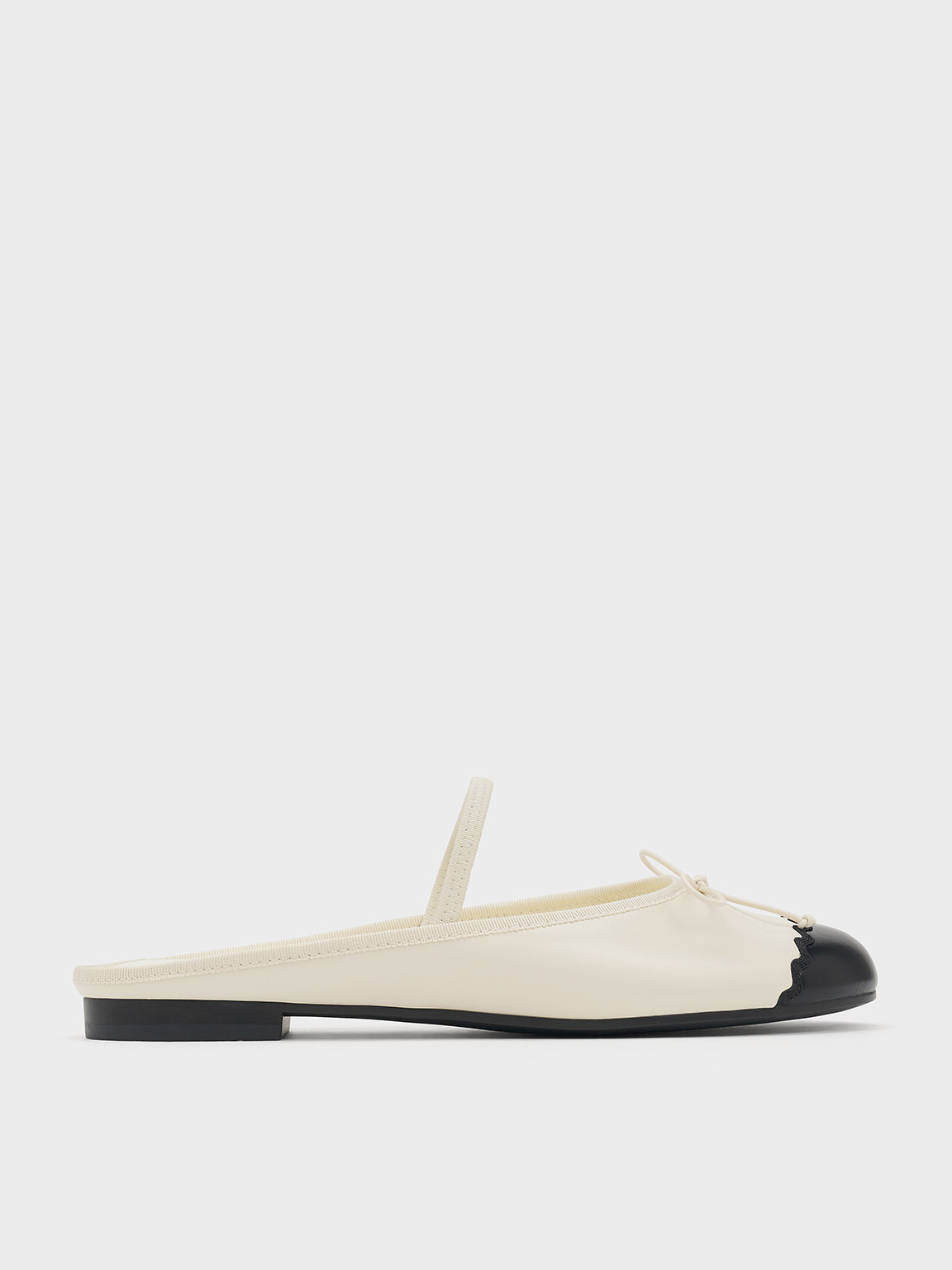 Shop Charles & Keith - Two-tone Bow Slip-on Flats In Cream