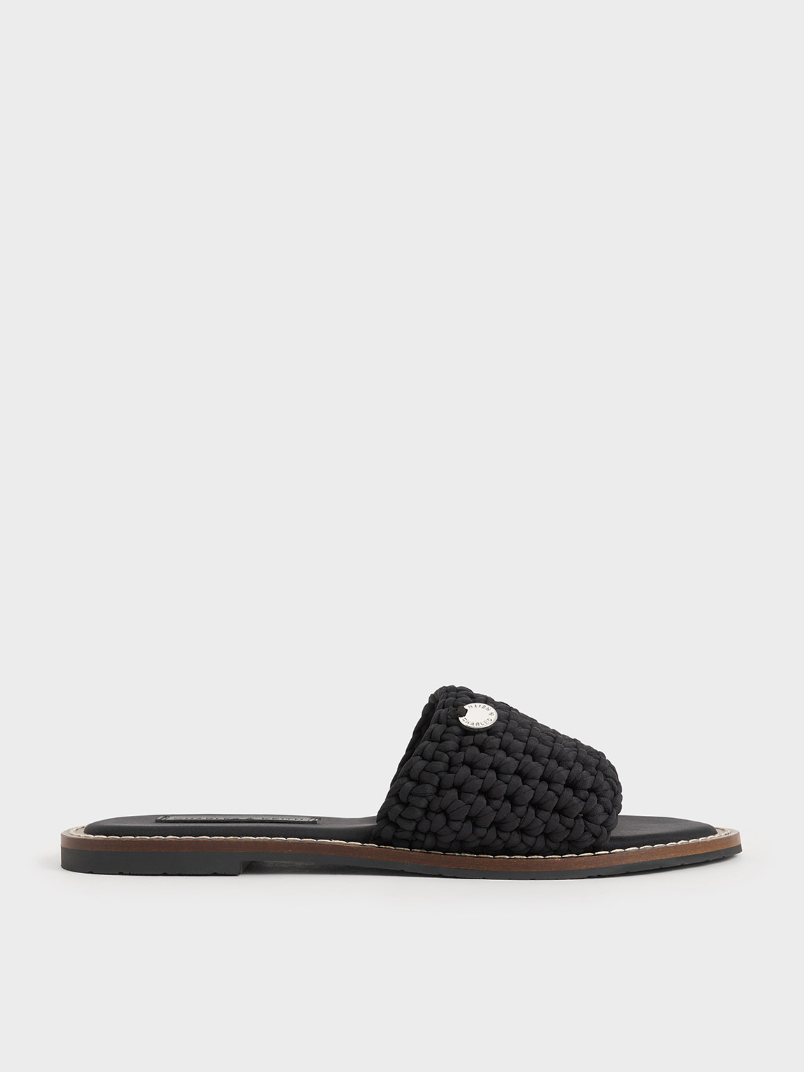 Shop Charles & Keith - Woven Slide Sandals In Black Textured
